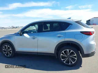 2023 Mazda CX-5 2.5 S Premium Package with VIN JM3KFBDM9P0173453, listed as a IAAI auction lot 41807979 with 34,156 mi miles. Bid and sale history available at carsss.com. Image 14.