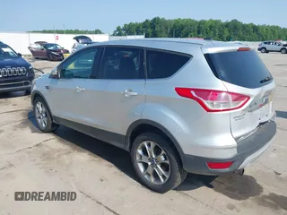 2013 Ford Escape SEL with VIN 1FMCU9H99DUA11243, listed as a IAAI auction lot 42356731 with 154,937 mi miles and . Bid and sale history available at DreamBid. Image 3.