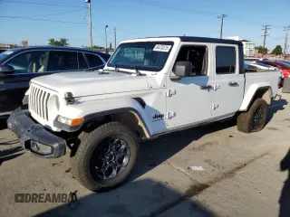 2023 Jeep Gladiator Sport S with VIN 1C6HJTAG4PL528847, listed as a Copart auction lot 64470375 with 36,177 mi miles and Salvage title. Bid and sale history available at DreamBid. Image 1.