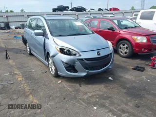 2012 Mazda 5 Grand Touring with VIN JM1CW2DL5C0121882, listed as a IAAI auction lot 42130184 with 141,565 mi miles and . Bid and sale history available at DreamBid. Image 1.