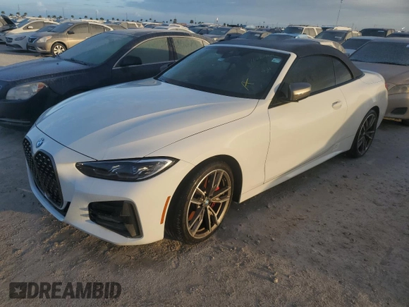 2022 BMW 4 Series M440i with VIN WBA53AT06NCK03623, listed as a Copart auction lot 76490964 with Not provided miles and Salvage title. Bid and sale history available at DreamBid. Image 1.