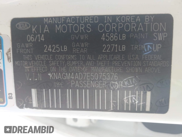 2014 Kia Optima Hybrid LX with VIN KNAGM4AD7E5075376, listed as a IAAI auction lot 42179468 with 131,920 mi miles. Bid and sale history available at carsss.com. Image 9.