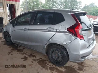 2018 Honda Fit LX with VIN 3HGGK5H4XJM735209, listed as a IAAI auction lot 42348191 with 161,902 mi miles and . Bid and sale history available at DreamBid. Image 3.