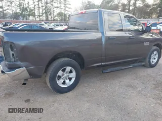 2018 Ram 1500 Tradesman z VIN 1C6RR6FG8JS284091, wystawiony jako IAAI lot #41439973 z przebiegiem 62 429 mil mil oraz . Historia ofert i sprzedaży dostępna na DreamBid. Obrazek 4.