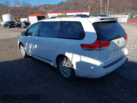 2014 Toyota Sienna Ltd with VIN 5TDDK3DC6ES076778, listed as a IAAI auction lot 41387091 with 173,497 mi miles. Bid and sale history available at carsss.com. Image 3.
