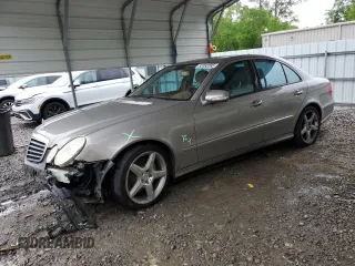 2009 Mercedes-Benz E-Class Luxury 3.5L with VIN WDBUF56X29B381268, listed as a Copart auction lot 52052295 with 133,049 mi miles and Salvage Title. Bid and sale history available at carsss.com. Image 1.