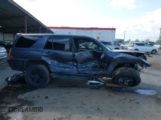 2004 Toyota 4Runner SR5 with VIN JTEBU14R748026917, listed as a IAAI auction lot 41938821 with 205,891 mi miles and . Bid and sale history available at DreamBid. Image 13.