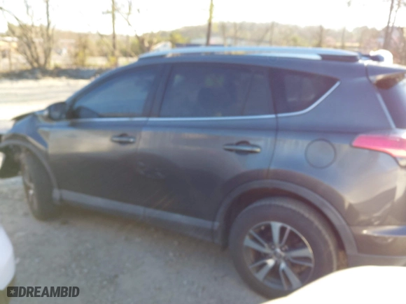 2016 Toyota RAV4 XLE with VIN 2T3WFREV0GW266691, listed as a IAAI auction lot 41804023 with 77,000 mi miles. Bid and sale history available at carsss.com. Image 14.