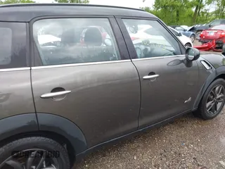 2011 MINI Countryman S with VIN WMWZC5C53BWM11022, listed as a IAAI auction lot 42249403 with 173,718 mi miles and . Bid and sale history available at DreamBid. Image 13.