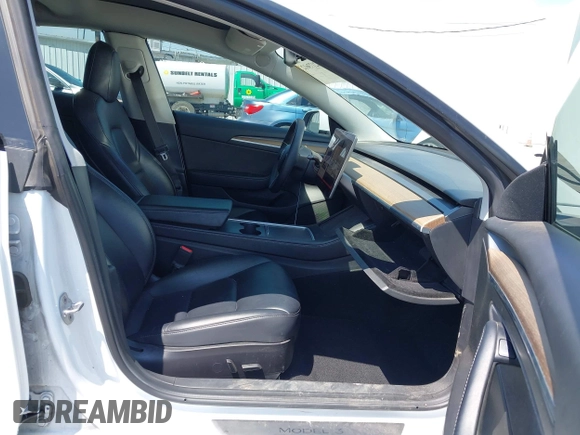 2022 Tesla Model 3 Long Range z VIN 5YJ3E1EB9NF113601, wystawiony jako IAAI lot #42173612 z przebiegiem 95 454 mil mil oraz . Historia ofert i sprzedaży dostępna na DreamBid. Obrazek 5.