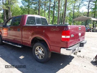 2006 Ford F-150 XLT with VIN 1FTPW14506FB81826, listed as a IAAI auction lot 42142287 with 136,768 mi miles. Bid and sale history available at carsss.com. Image 3.