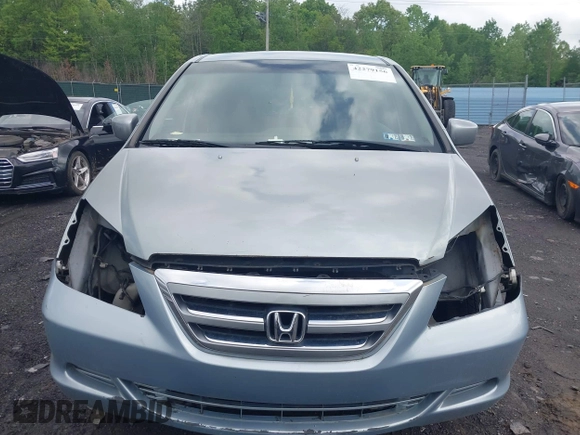2006 Honda Odyssey EX z VIN 5FNRL38456B129594, wystawiony jako IAAI lot #42279156 z przebiegiem Nie podano mil oraz . Historia ofert i sprzedaży dostępna na DreamBid. Obrazek 6.
