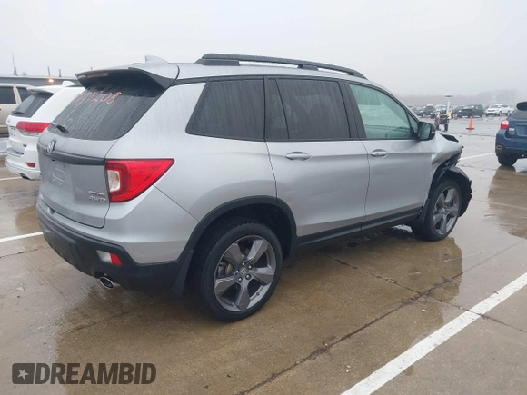 2021 Honda Passport Touring z VIN 5FNYF8H9XMB019732, wystawiony jako IAAI lot #41459208 z przebiegiem 41 745 mil mil oraz . Historia ofert i sprzedaży dostępna na DreamBid. Obrazek 4.