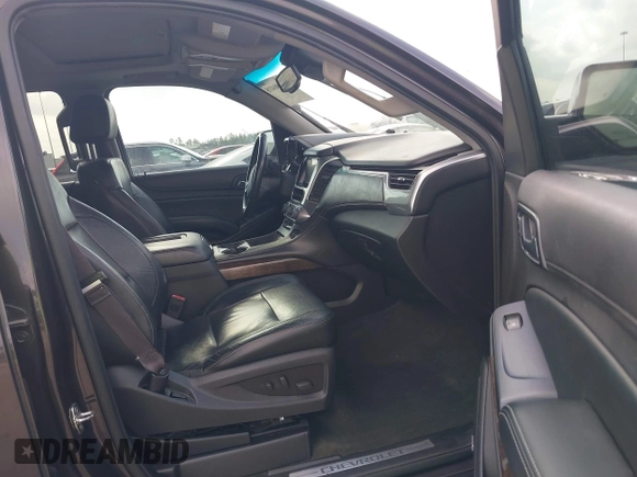 2015 Chevrolet Suburban LT with VIN 1GNSCJKCXFR175154, listed as a IAAI auction lot 42280418 with 227,373 mi miles and . Bid and sale history available at DreamBid. Image 5.