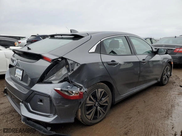 2017 Honda Civic Hatchback EX with VIN SHHFK7H55HU210523, listed as a Copart auction lot 46243045 with 122,483 mi miles and Salvage Title. Bid and sale history available at carsss.com. Image 3.