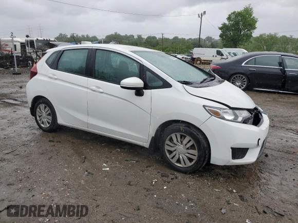2015 Honda Fit LX with VIN 3HGGK5H57FM722000, listed as a Copart auction lot 57331455 with 140,546 mi miles and Salvage title. Bid and sale history available at DreamBid. Image 4.
