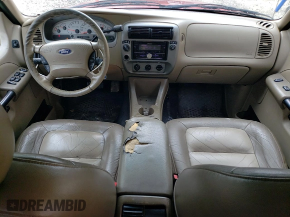 2004 Ford Explorer Sport Trac XLS z VIN 1FMDU77K44UA34720, wystawiony jako Copart lot #55726075 z przebiegiem 192 547 mil mil oraz Szkoda całkowita • Salvage title. Historia ofert i sprzedaży dostępna na DreamBid. Obrazek 8.