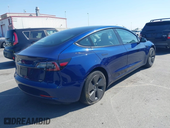 2023 Tesla Model 3 with VIN 5YJ3E1EA1PF431190, listed as a IAAI auction lot 41980007 with 26,164 mi miles and . Bid and sale history available at DreamBid. Image 4.