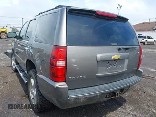 2013 Chevrolet Tahoe LTZ with VIN 1GNSKCE0XDR373858, listed as a IAAI auction lot 42456875 with 297,084 mi miles and . Bid and sale history available at DreamBid. Image 3.