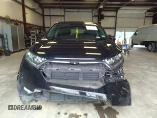 2019 Honda CR-V LX with VIN 2HKRW5H30KH417867, listed as a IAAI auction lot 36884921 with Not Provided miles and . Bid and sale history available at DreamBid. Image 12.