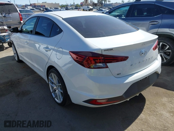 2020 Hyundai Elantra SE z VIN 5NPD74LF3LH503856, wystawiony jako IAAI lot #42320446 z przebiegiem 122 629 mil mil oraz . Historia ofert i sprzedaży dostępna na DreamBid. Obrazek 3.
