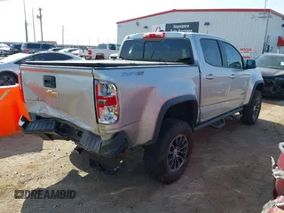 2017 Chevrolet Colorado 4WD ZR2 z VIN 1GCGTEEN3H1304064, wystawiony jako IAAI lot #41919435 z przebiegiem 46 754 mil mil oraz . Historia ofert i sprzedaży dostępna na DreamBid. Obrazek 4.
