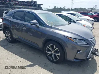 2016 Lexus RX 450h z VIN 2T2BGMCAXGC005914, wystawiony jako IAAI lot #42156530 z przebiegiem 94 050 mil mil oraz . Historia ofert i sprzedaży dostępna na DreamBid. Obrazek 1.
