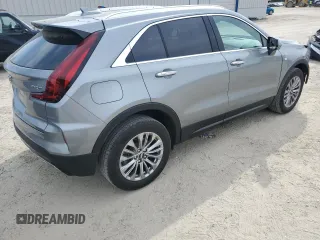2024 Cadillac XT4 FWD Premium Luxury with VIN 1GYFZCR48RF169081, listed as a Copart auction lot 52429215 with 13,630 mi miles and Salvage title. Bid and sale history available at DreamBid. Image 3.