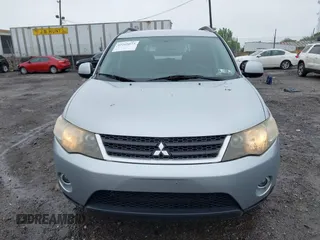 2007 Mitsubishi Outlander LS z VIN JA4MT31X67U011541, wystawiony jako IAAI lot #42265073 z przebiegiem 92 230 mil mil oraz . Historia ofert i sprzedaży dostępna na DreamBid. Obrazek 11.