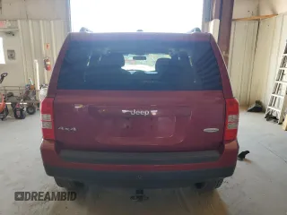 2014 Jeep Patriot Latitude with VIN 1C4NJRFB3ED792919, listed as a Copart auction lot 66043945 with 142,224 mi miles and Salvage title. Bid and sale history available at DreamBid. Image 6.