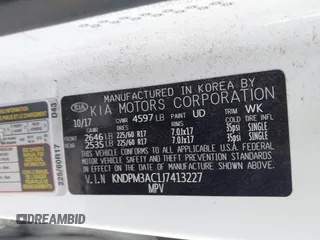 2018 Kia Sportage LX with VIN KNDPM3AC1J7413227, listed as a IAAI auction lot 42188566 with 77,897 mi miles and . Bid and sale history available at carsss.com. Image 9.