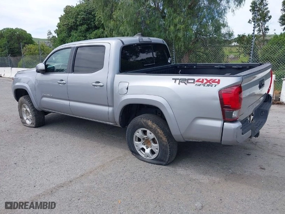 2019 Toyota Tacoma 4WD SR with VIN 3TMCZ5AN4KM194526, listed as a IAAI auction lot 42021504 with 87,767 mi miles. Bid and sale history available at carsss.com. Image 3.