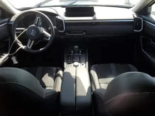 2025 Mazda CX-50 S Select with VIN 7MMVABAMXSN301011, listed as a Copart auction lot 77063504 with Not Provided miles and Salvage Title. Bid and sale history available at DreamBid. Image 8.
