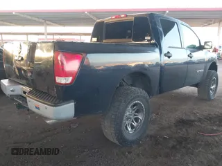 2006 Nissan Titan SE z VIN 1N6AA07AX6N509540, wystawiony jako IAAI lot #42054973 z przebiegiem 166 413 mil mil oraz . Historia ofert i sprzedaży dostępna na DreamBid. Obrazek 4.