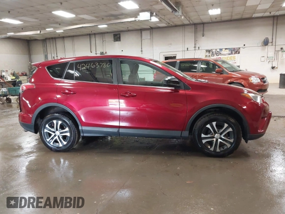2018 Toyota RAV4 LE with VIN 2T3BFREV9JW825953, listed as a IAAI auction lot 42463780 with 74,128 mi miles and . Bid and sale history available at DreamBid. Image 13.