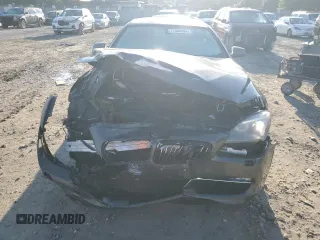 2014 BMW 6 Series 640i z VIN WBA6A0C58EDZ04545, wystawiony jako Copart lot #71086984 z przebiegiem 99 048 mil mil oraz Szkoda całkowita • Salvage title. Historia ofert i sprzedaży dostępna na DreamBid. Obrazek 5.