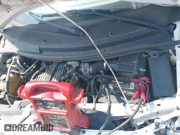 2006 Ford Freestar SE z VIN 2FMDA51666BA57711, wystawiony jako IAAI lot #39989040 z przebiegiem Nie podano mil oraz . Historia ofert i sprzedaży dostępna na DreamBid. Obrazek 10.