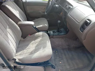 2000 Toyota 4Runner with VIN JT3GM84R6Y0055563, listed as a IAAI auction lot 41885830 with 243,885 mi miles. Bid and sale history available at carsss.com. Image 5.