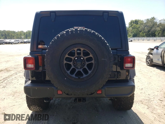 2023 Jeep Wrangler Willys with VIN 1C4HJXDG7PW520719, listed as a Copart auction lot 68978644 with 35,667 mi miles and Clean Title. Bid and sale history available at DreamBid. Image 6.