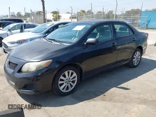 2009 Toyota Corolla with VIN 1NXBU40E89Z056754, listed as a IAAI auction lot 41989594 with 187,890 mi miles. Bid and sale history available at carsss.com. Image 2.