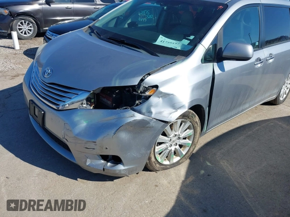 2011 Toyota Sienna XLE AAS with VIN 5TDYK3DC6BS147636, listed as a IAAI auction lot 41759192 with 182,966 mi miles and . Bid and sale history available at DreamBid. Image 6.