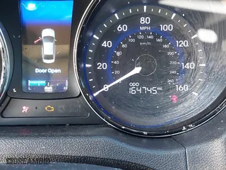 2013 Hyundai Sonata Hybrid Limited with VIN KMHEC4A40DA090333, listed as a IAAI auction lot 41479624 with 164,745 mi miles. Bid and sale history available at carsss.com. Image 16.