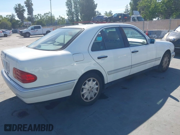 1996 Mercedes-Benz E 320 with VIN WDBJF55F1TJ014659, listed as a IAAI auction lot 42273213 with 151,584 mi miles and . Bid and sale history available at DreamBid. Image 4.