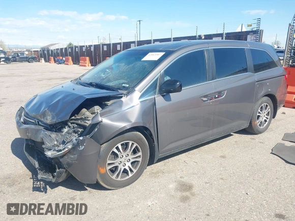 2012 Honda Odyssey EX-L with VIN 5FNRL5H61CB095789, listed as a IAAI auction lot 42065507 with 138,570 mi miles and . Bid and sale history available at DreamBid. Image 2.