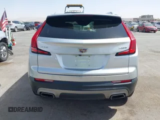 2021 Cadillac XT4 FWD Premium Luxury with VIN 1GYFZCR42MF005253, listed as a IAAI auction lot 40470700 with 70,571 mi miles and . Bid and sale history available at carsss.com. Image 16.