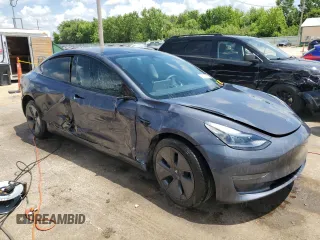2023 Tesla Model 3 with VIN 5YJ3E1EA4PF614129, listed as a Copart auction lot 62019385 with 23,218 mi miles and Salvage title. Bid and sale history available at DreamBid. Image 4.