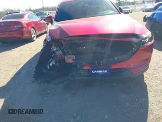 2019 Mazda CX-5 Sport with VIN JM3KFBBM2K0508743, listed as a IAAI auction lot 41288659 with 77,710 mi miles and . Bid and sale history available at DreamBid. Image 6.