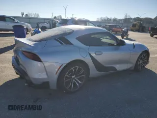 2022 Toyota GR Supra 2.0 with VIN WZ1DB2C08NW046734, listed as a Copart auction lot 83992154 with 43,576 mi miles and Salvage Title. Bid and sale history available at carsss.com. Image 3.