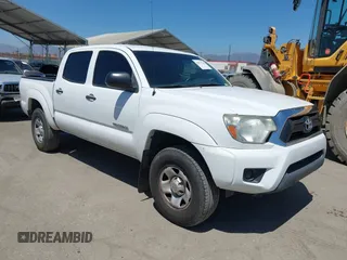 2015 Toyota Tacoma PreRunner with VIN 5TFJX4GN2FX040198, listed as a IAAI auction lot 42614220 with 113,372 mi miles and . Bid and sale history available at DreamBid. Image 1.