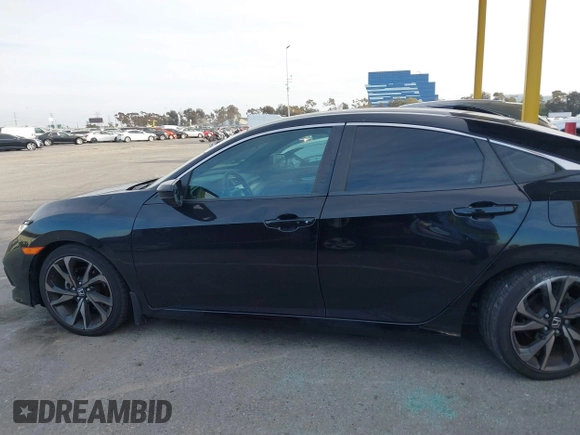 2021 Honda Civic Sport with VIN 2HGFC2F81MH515005, listed as a IAAI auction lot 41725843 with 43,583 mi miles and . Bid and sale history available at DreamBid. Image 14.